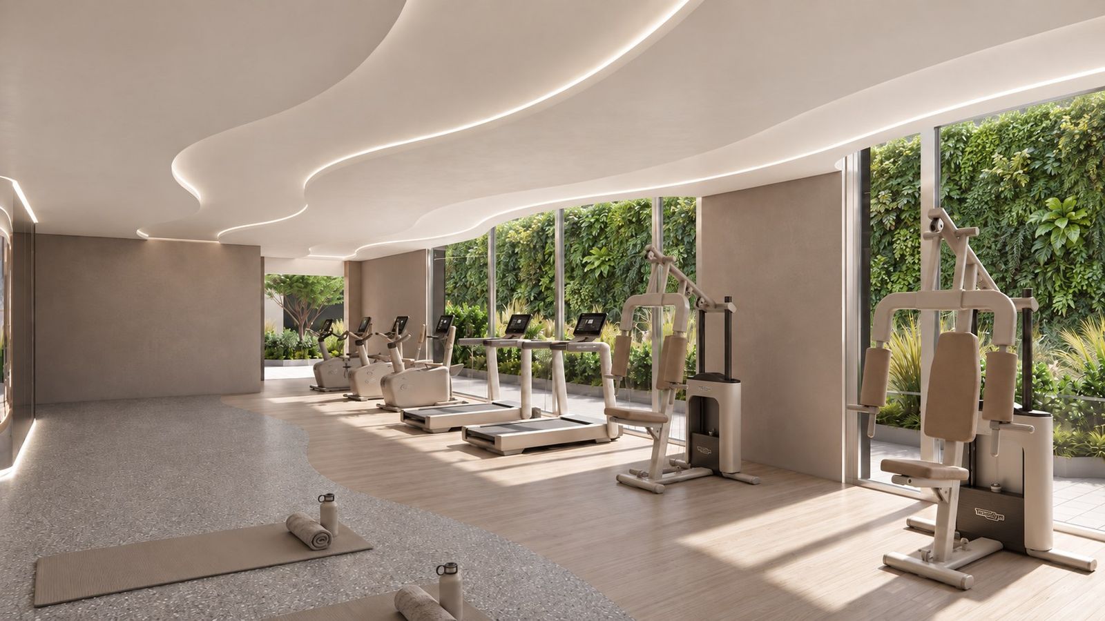 Gimnasio con máquinas y jardín vertical